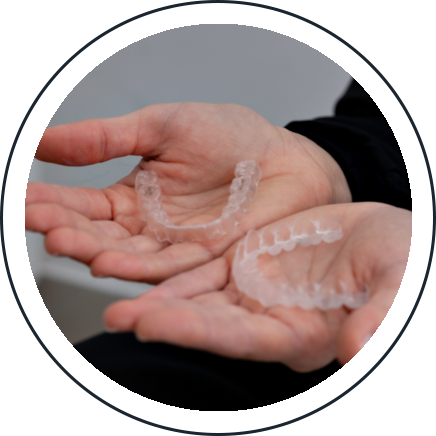 Patient wearing clear Invisalign aligners at Deerfoot Dental Centre in Calgary